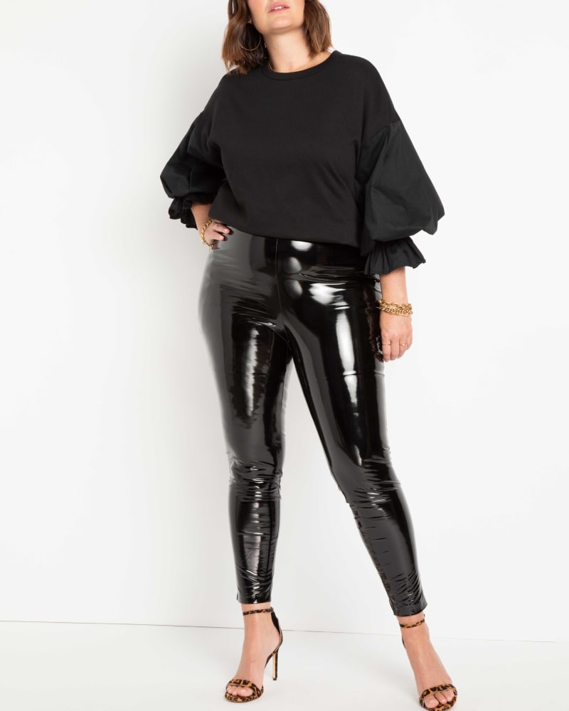 Front of a model wearing a size 14 Katrina Latex Leggings in Black Onyx by ELOQUII. | dia_product_style_image_id:236643
